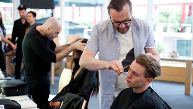 Sassoon Working On The Model's Hair For The YMC SS15 Runway Show At LC:M