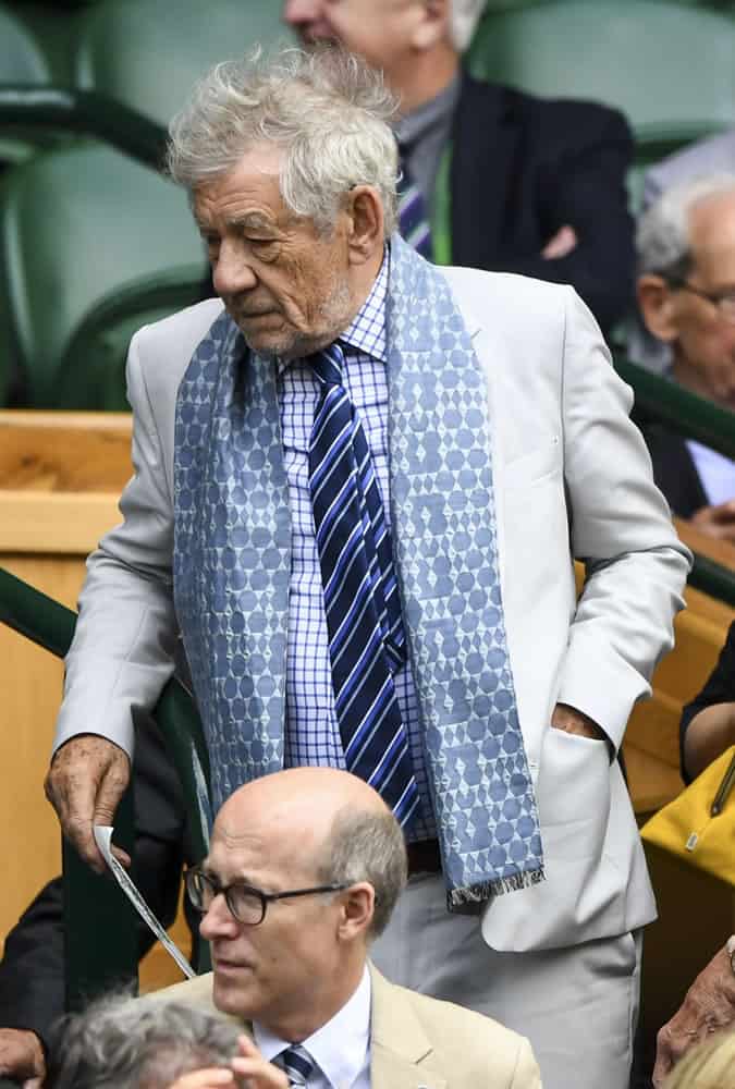 Sir Ian McKellan wearing a suit and scarf at Wimbledon 2017