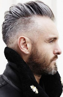 Pompadour hairstyle with skin fade on sides