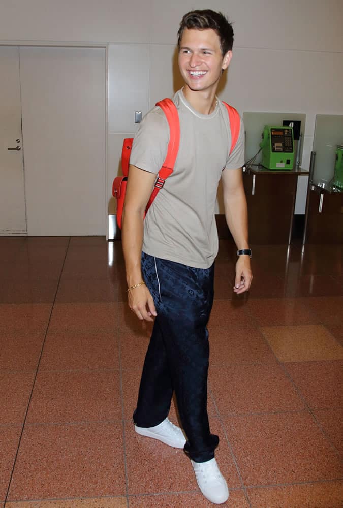 Ansel Elgort wearing LV tracksuit bottoms