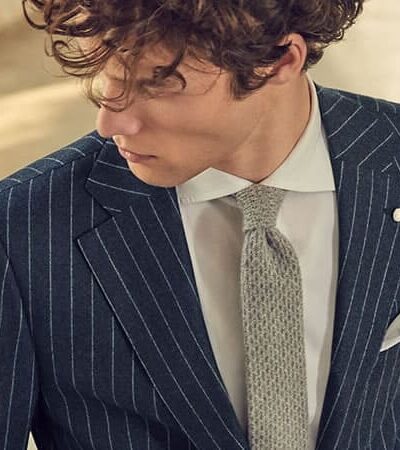 Why You Should Own A Pinstripe Suit (And How To Wear It)
