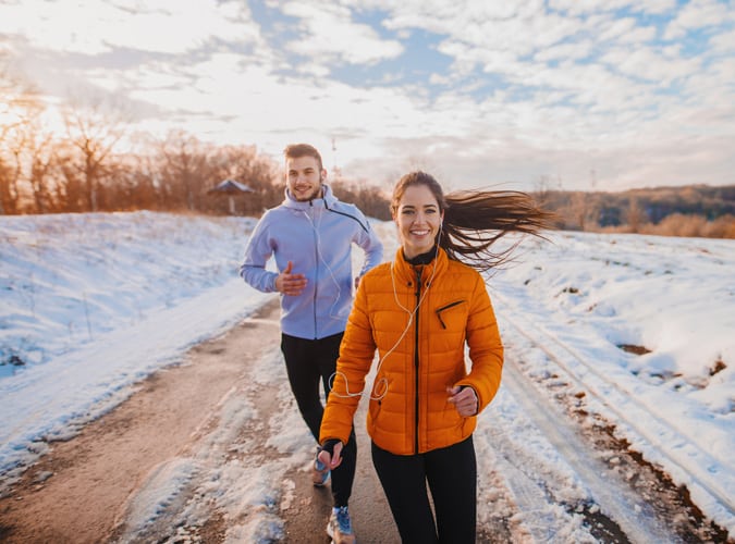 7 Ways To Beat SAD This Winter - Couple running
