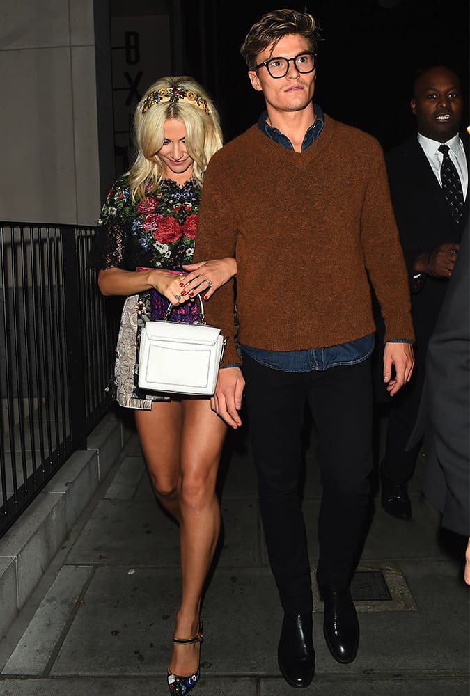 Oliver Chesire wearing a V-neck jumper