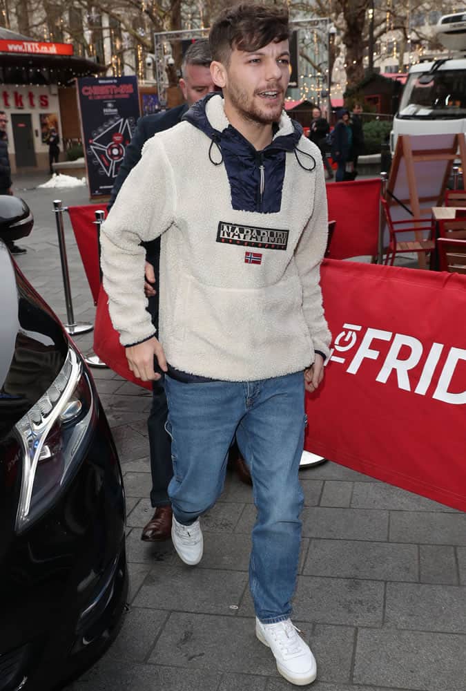 Louis Tomlinson Wearing A Fleece Top And Jeans