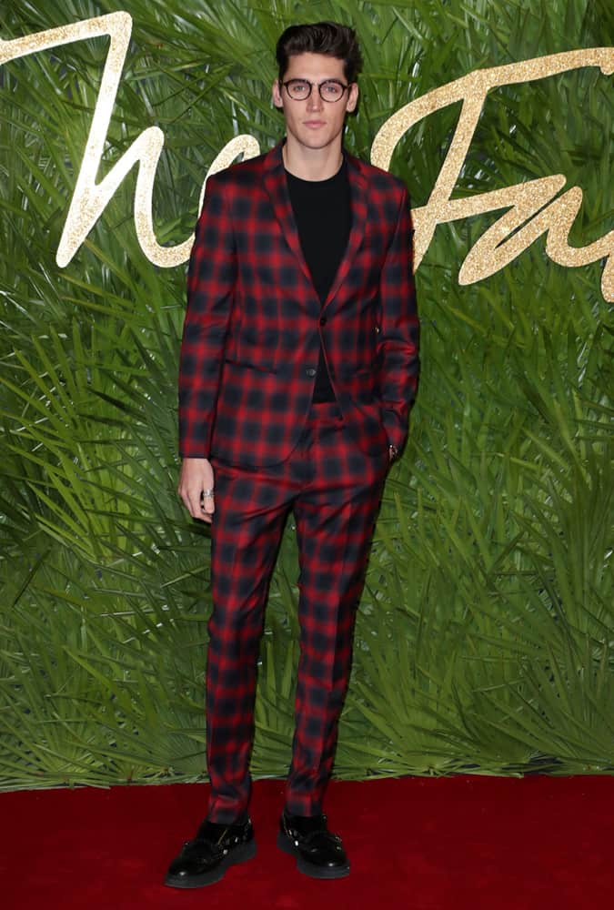 Isaac Carew Dressed In A Check Suit At The British Fashion Awards