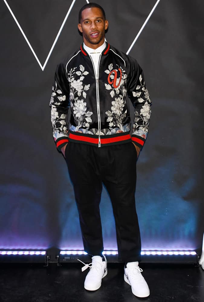 Victor Cruz wearing an embroidered bomber jacket