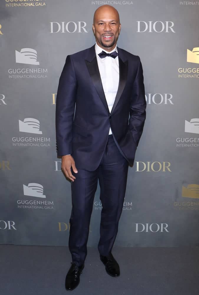 Common Wearing A Navy Tuxedo