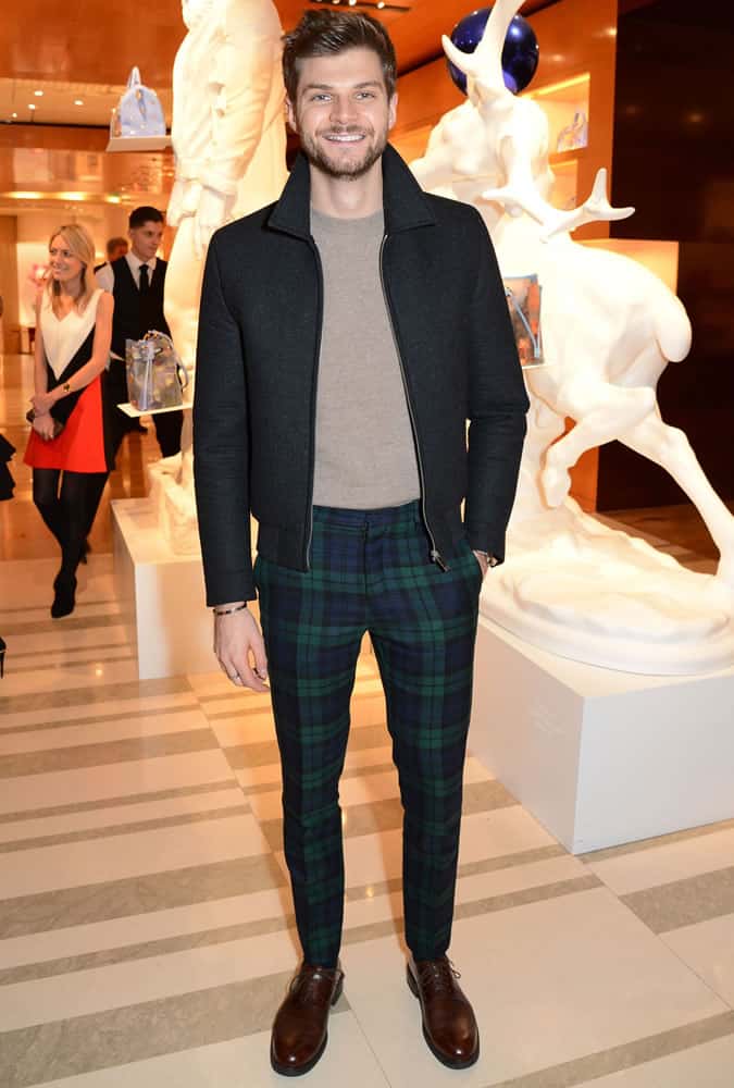 Jim Chapman Wearing A Jacket With Tartan Trousers
