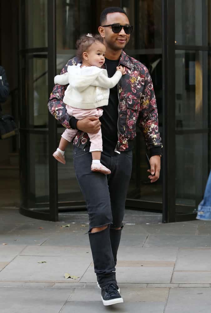 John Legend wearing a floral pilot jacket
