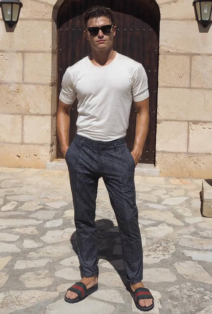 Oliver Cheshire pictured in Majorca wearing printed trousers