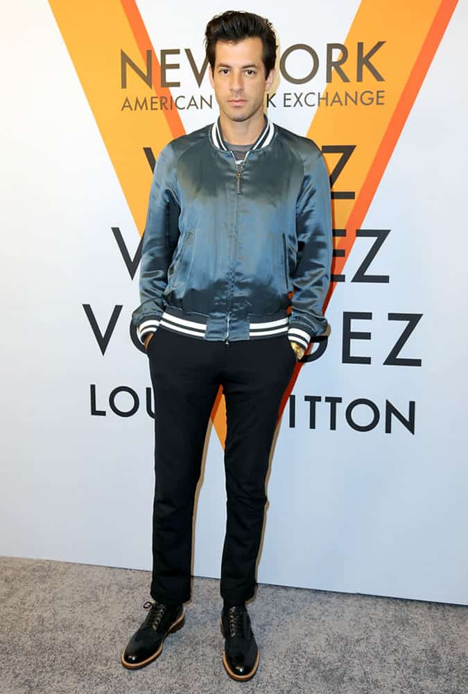 Mark Ronson wearing a blue bomber jacket