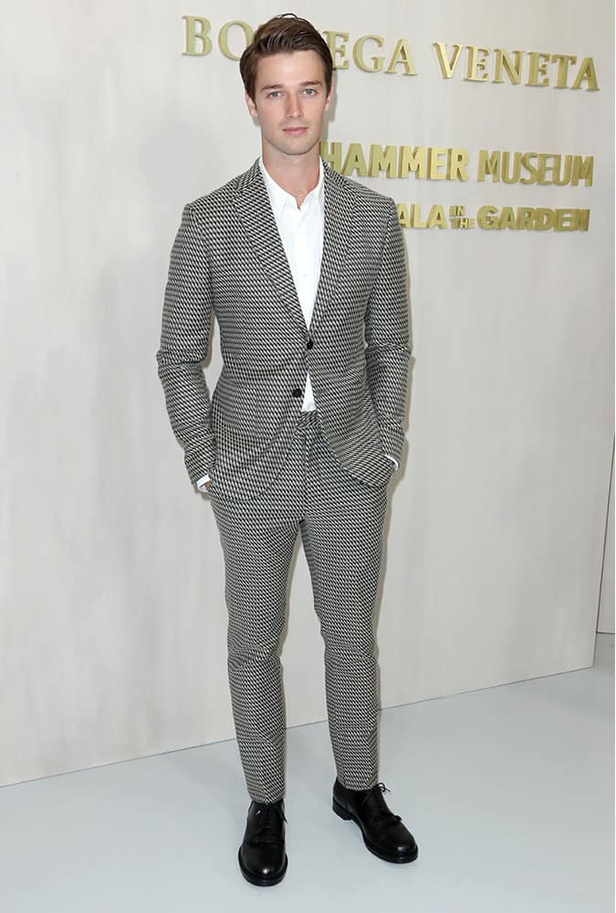 Patrick Schwarzenegger wearing a printed suit