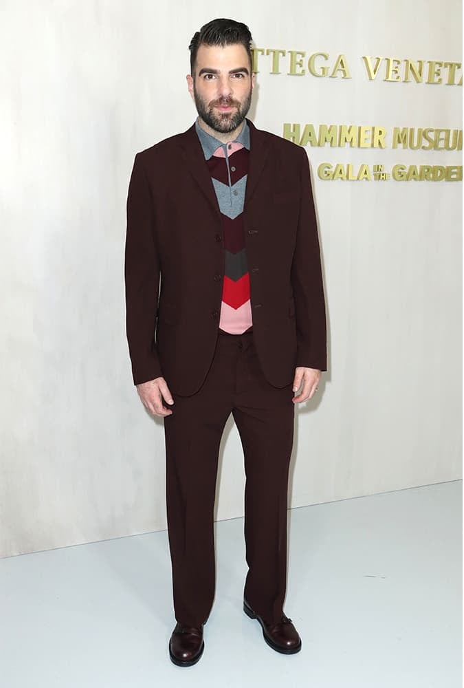 Zachary Quinto wearing a burgundy suit