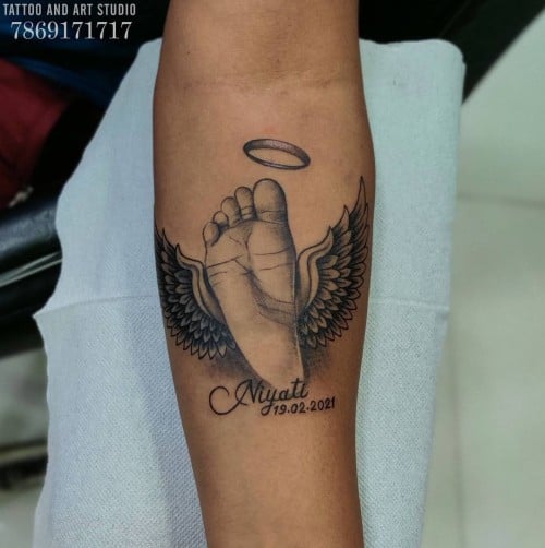 Baby Footprint Tattoo with Angel Wings