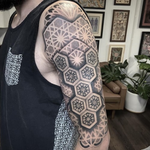 Geometric arm tattoo