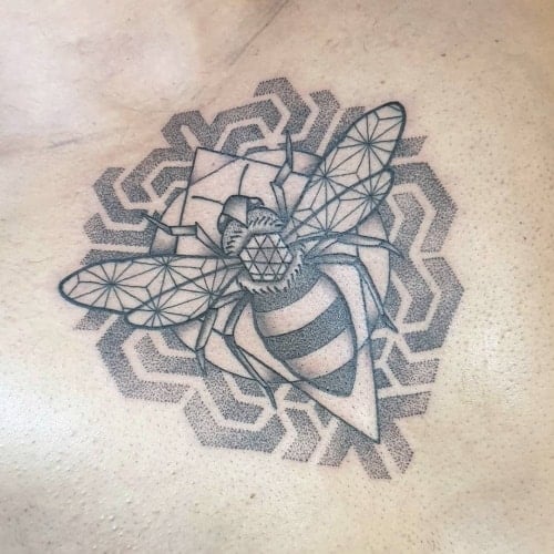 Geometric bee tattoo