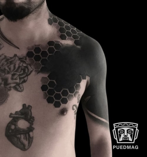 Geometric blackwork tattoo