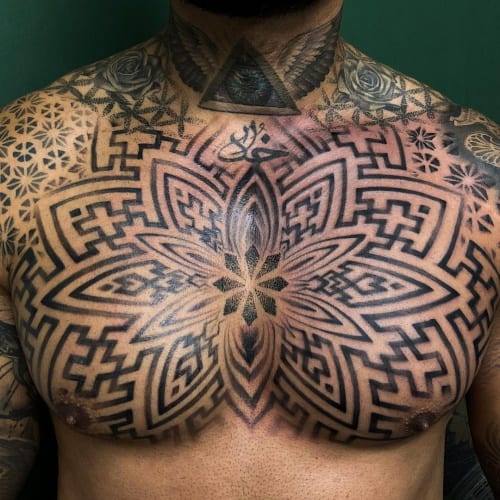 Geometric chest tattoo