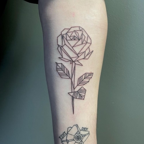 Geometric rose tattoo