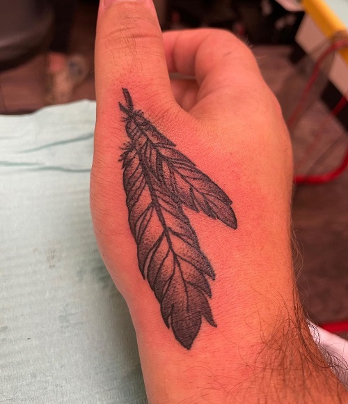 Feather Hand Tattoo
