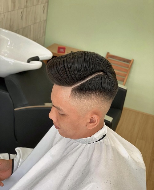 Pushed Back Skin Fade with Hard Part