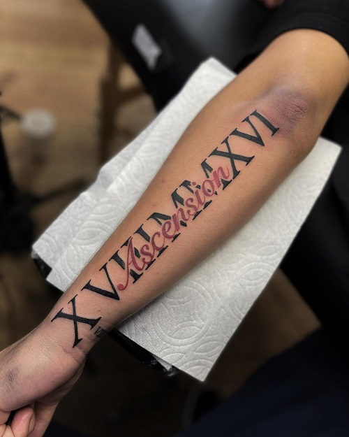 Roman Numeral Arm Tattoo