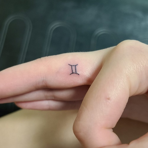 Gemini finger tattoo