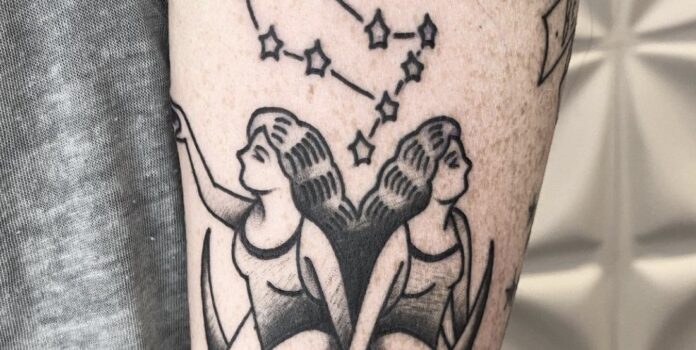 Man with Gemini Tattoo on Upper Arm