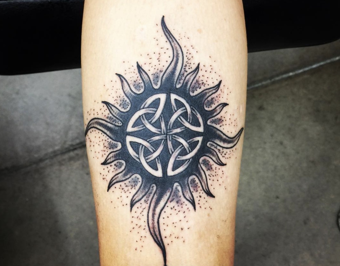 Celtic Sun tattoo on calf 