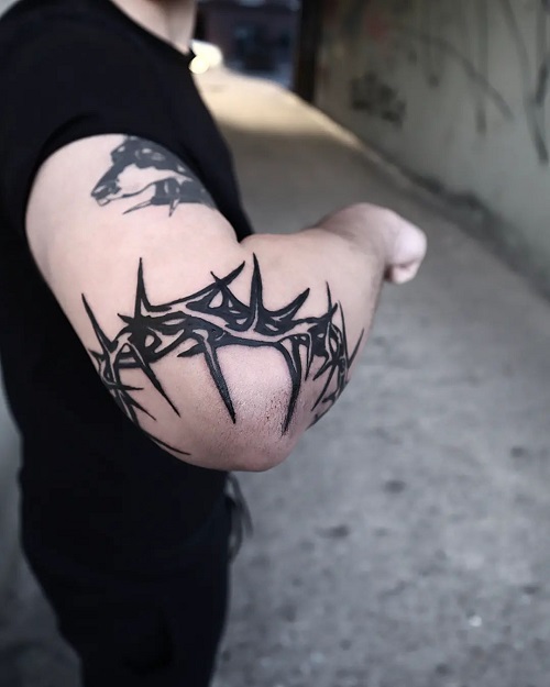 Religious Elbow Tattoo