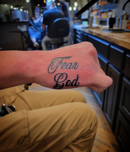 Religious Hand Tattoo