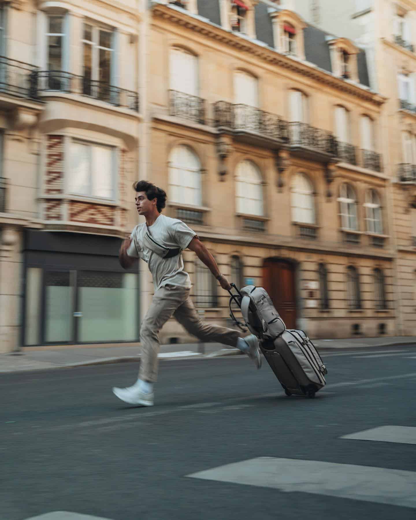 a man running with luggage