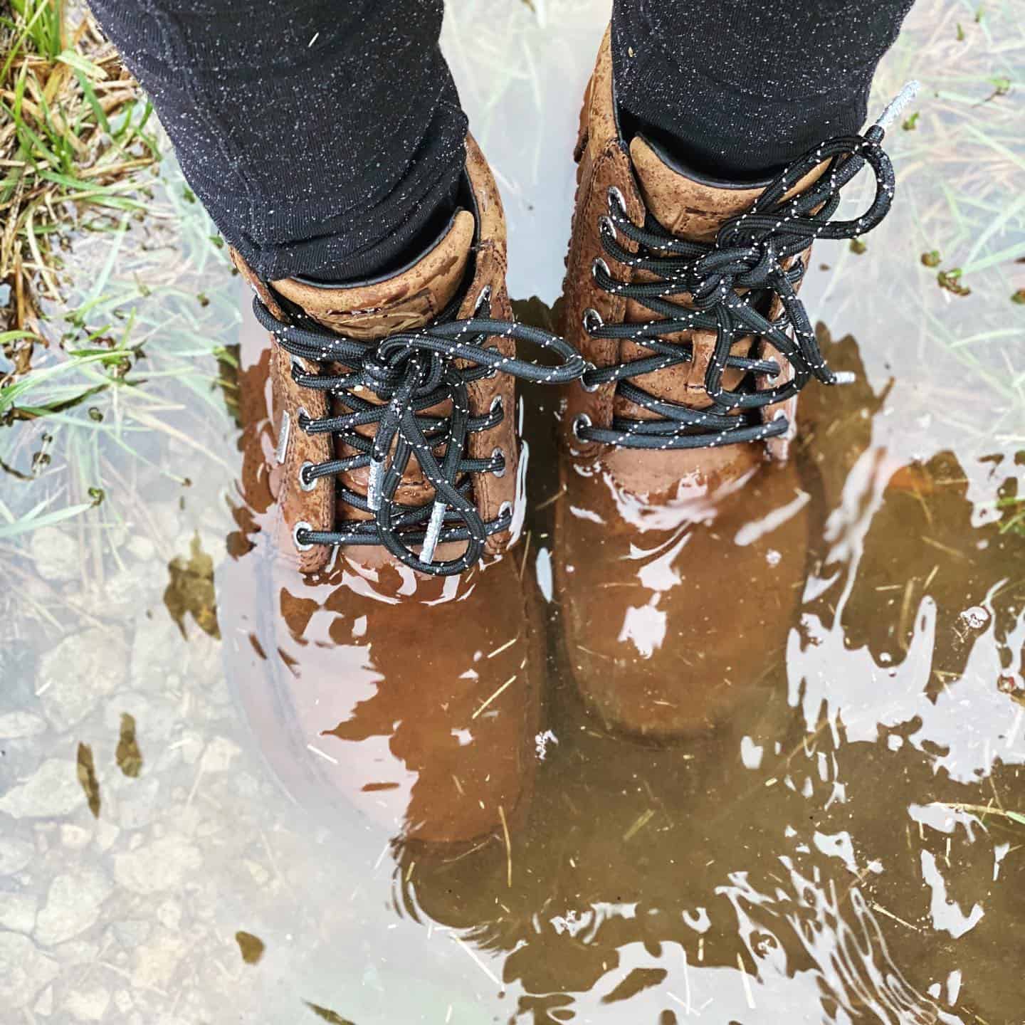waterproofed boots submerged in water