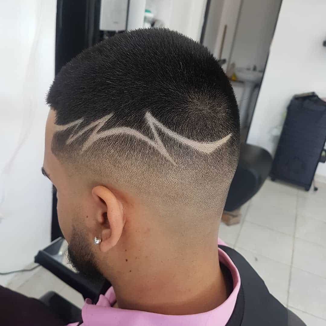 clean fade haircut with design