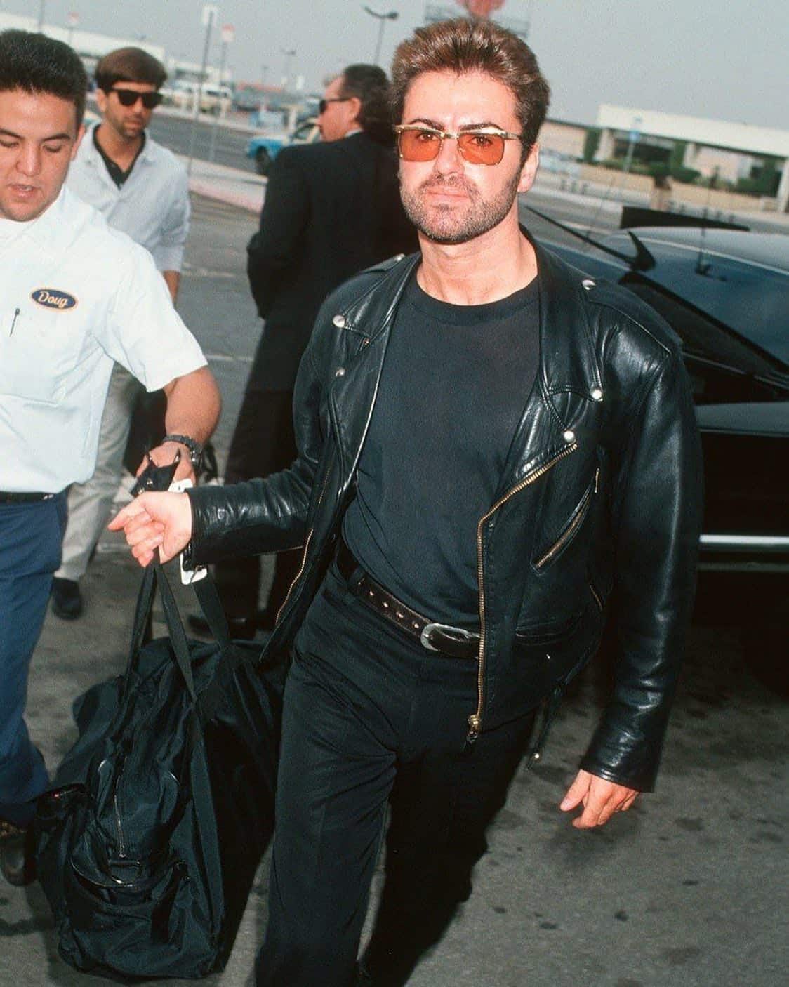 george michael wearing all black outfit 1990