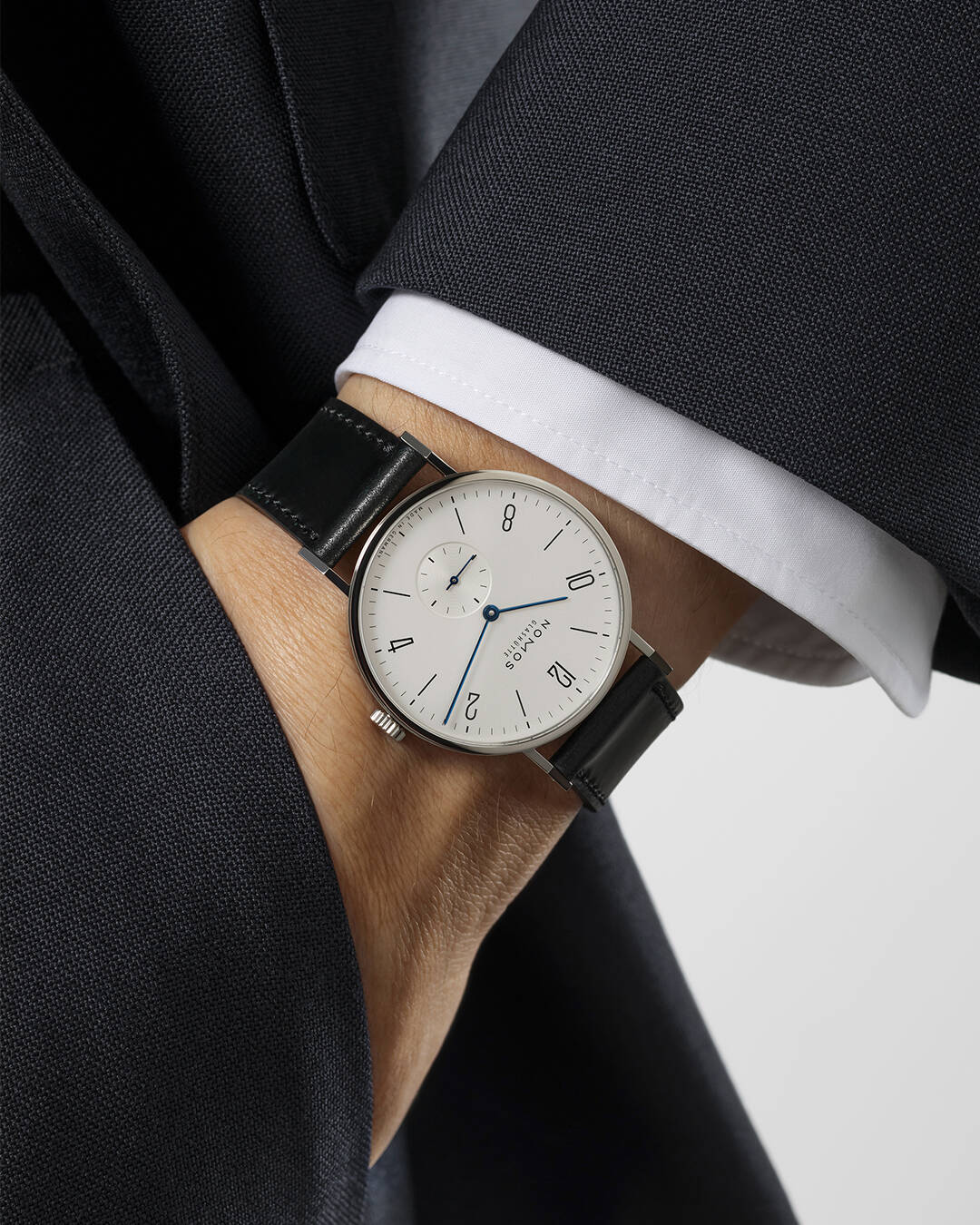 wearing the tangente 38 date watch by nomos glashuette