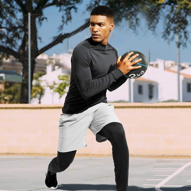 man exercising with a 2kg medicine ball