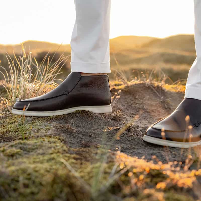 wearing a pair of aurelien leather City Loafers